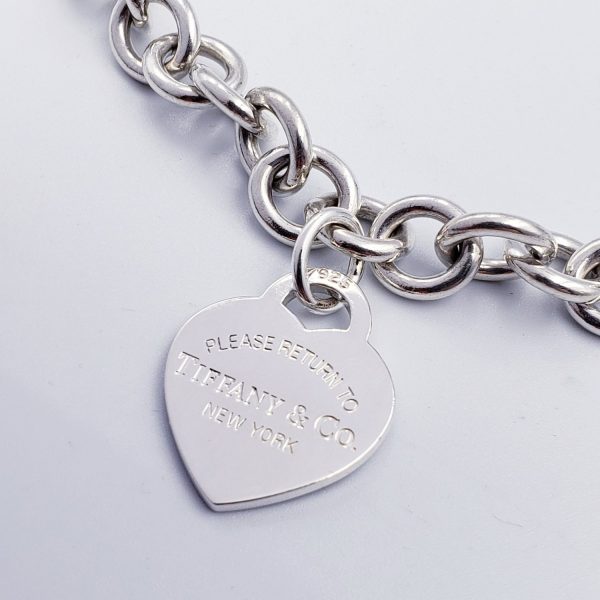 Tiffany Charms tag in sterling silver, medium.